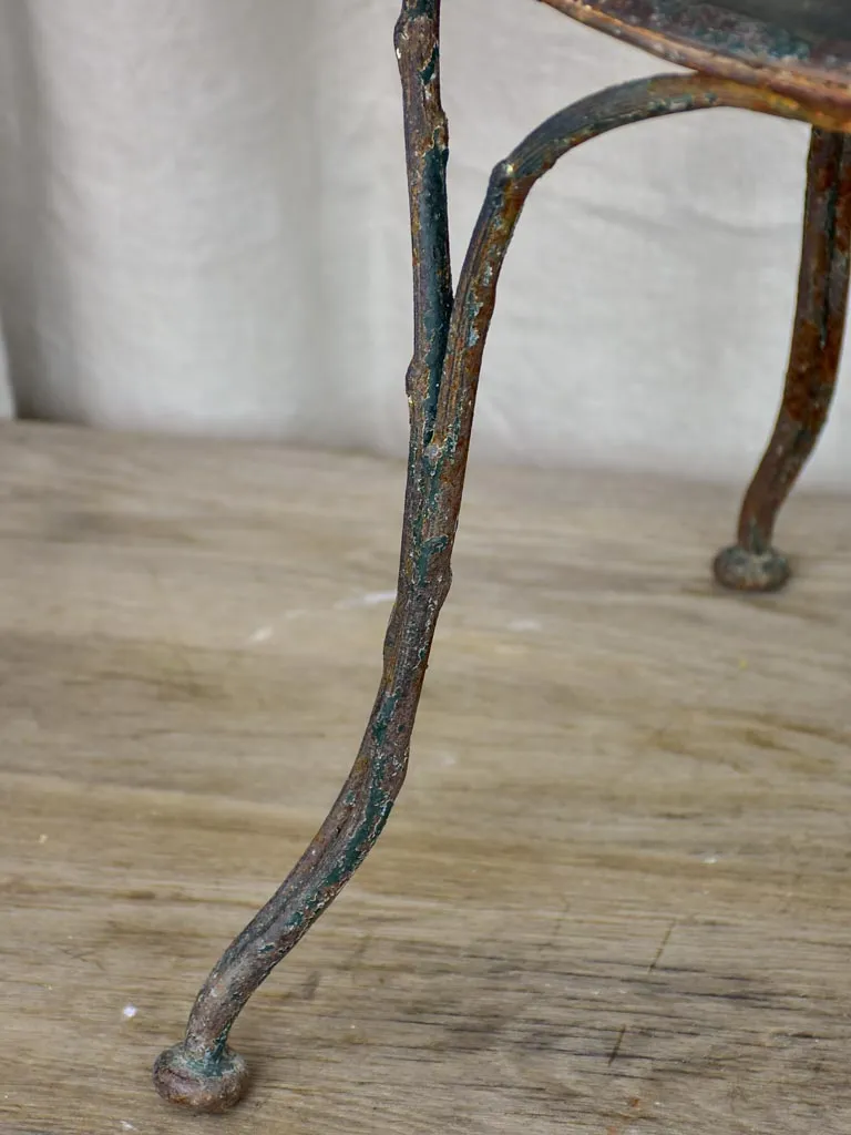 Antique French garden chair with branch - like back